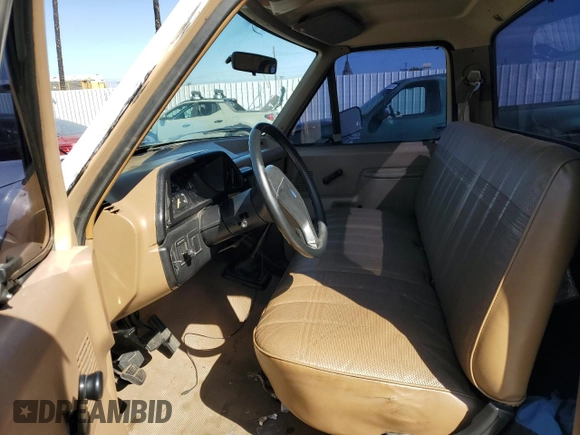 1989 Ford F-150 with VIN 1FTDF15Y6KKB77485, listed as a Copart auction lot 48943525 with 95,808 mi miles and Salvage Title. Bid and sale history available at carsss.com. Image 7.