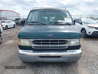 1999 Ford Econoline Cargo with VIN 1FDRE14W4XHC30466, listed as a IAAI auction lot 41935293 with 276,092 mi miles. Bid and sale history available at carsss.com. Image 6.