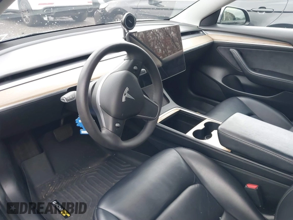 2022 Tesla Model 3 with VIN 5YJ3E1EA6NF143839, listed as a IAAI auction lot 40905007 with 83,897 mi miles and . Bid and sale history available at DreamBid. Image 5.