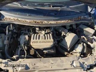 1995 Ford Windstar GL z VIN 2FMDA5148SBB49573, wystawiony jako IAAI lot #42024606 z przebiegiem 264 868 mil mil oraz . Historia ofert i sprzedaży dostępna na DreamBid. Obrazek 10.