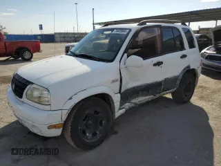 2002 Suzuki Grand Vitara JLX z VIN JS3TD62V824154031, wystawiony jako Copart lot #76403684 z przebiegiem 208 529 mil mil oraz Szkoda całkowita • Salvage title. Historia ofert i sprzedaży dostępna na DreamBid. Obrazek 1.