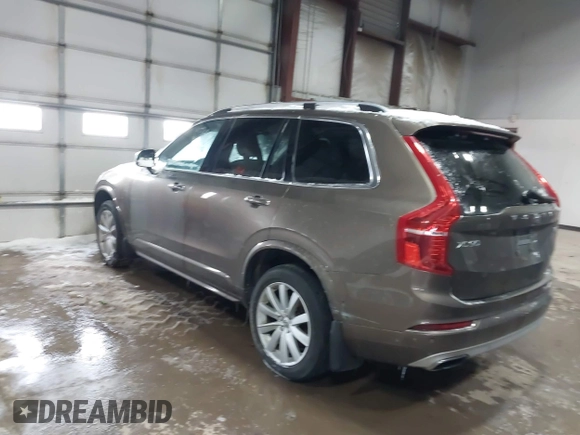 2016 Volvo XC90 T6 Momentum with VIN YV4A22PK6G1022376, listed as a IAAI auction lot 41595150 with 128,877 mi miles. Bid and sale history available at carsss.com. Image 3.