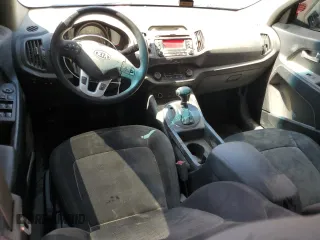 2012 Kia Sportage LX with VIN KNDPB3A25C7345952, listed as a Copart auction lot 57830015 with 101,757 mi miles and Salvage title. Bid and sale history available at DreamBid. Image 8.