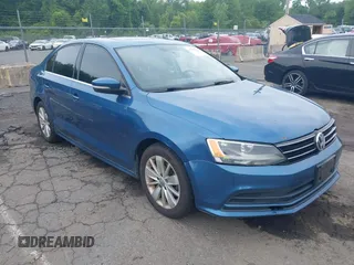 2015 Volkswagen Jetta SE z VIN 3VWD17AJ3FM244971, wystawiony jako IAAI lot #42392233 z przebiegiem 166 051 mil mil oraz . Historia ofert i sprzedaży dostępna na DreamBid. Obrazek 1.
