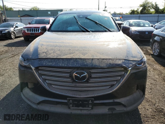 2021 Mazda CX-9 Sport with VIN JM3TCBBY3M0527756, listed as a Copart auction lot 68414324 with Not Provided miles and Salvage Title. Bid and sale history available at DreamBid. Image 5.