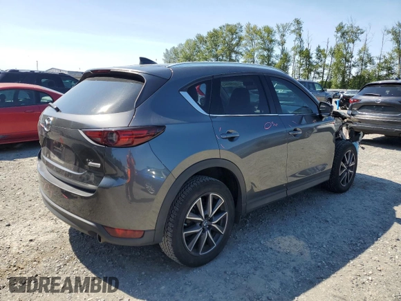 2018 Mazda CX-5 Grand Touring with VIN JM3KFBDM5J0373351, listed as a Copart auction lot 59395945 with Not provided miles and Salvage title. Bid and sale history available at DreamBid. Image 3.