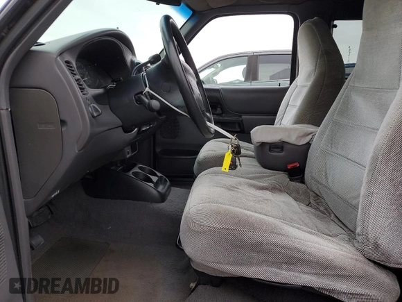 2000 Ford Ranger XL with VIN 1FTYR14V1YTA91858, listed as a Copart auction lot 54863035 with 244,120 mi miles and Salvage Title. Bid and sale history available at DreamBid. Image 7.