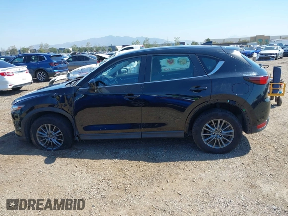 2020 Mazda CX-5 Sport with VIN JM3KFABM2L0761184, listed as a IAAI auction lot 41847768 with 47,582 mi miles. Bid and sale history available at carsss.com. Image 14.