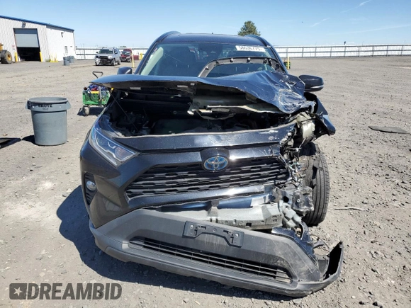 2020 Toyota RAV4 Hybrid XLE with VIN 2T3RWRFV0LW091705, listed as a Copart auction lot 58636775 with 68,534 mi miles and Salvage title. Bid and sale history available at DreamBid. Image 5.