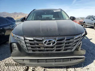 2022 Hyundai Tucson SEL with VIN 5NMJBCAE5NH030189, listed as a Copart auction lot 75327374 with 33,864 mi miles and Salvage Title. Bid and sale history available at DreamBid. Image 5.