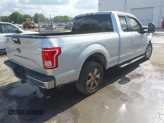 2015 Ford F-150 XL with VIN 1FTEX1CP1FKE81373, listed as a IAAI auction lot 42176024 with 186,808 mi miles. Bid and sale history available at carsss.com. Image 4.