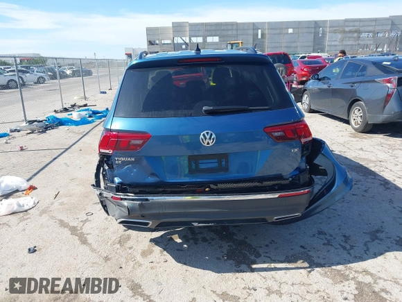 2018 Volkswagen Tiguan SEL z VIN 3VV3B7AX2JM155306, wystawiony jako IAAI lot #42457735 z przebiegiem 48 061 mil mil oraz . Historia ofert i sprzedaży dostępna na DreamBid. Obrazek 6.