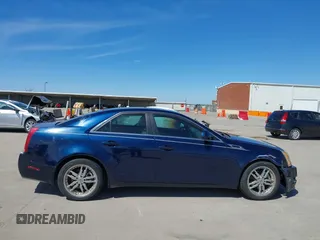 2008 Cadillac CTS AWD z VIN 1G6DH577980158801, wystawiony jako IAAI lot #41805061 z przebiegiem 99 579 mil mil oraz . Historia ofert i sprzedaży dostępna na DreamBid. Obrazek 14.