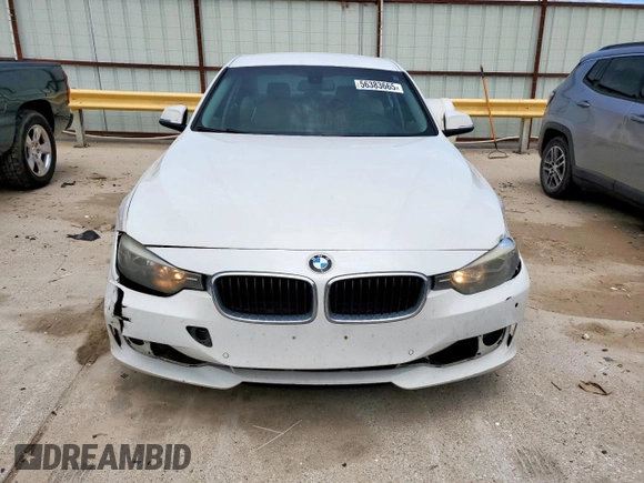 2014 BMW 3 Series 320i z VIN WBA3B1C57EP679989, wystawiony jako Copart lot #56383665 z przebiegiem 125 617 mil mil oraz Szkoda całkowita • Salvage title. Historia ofert i sprzedaży dostępna na DreamBid. Obrazek 5.