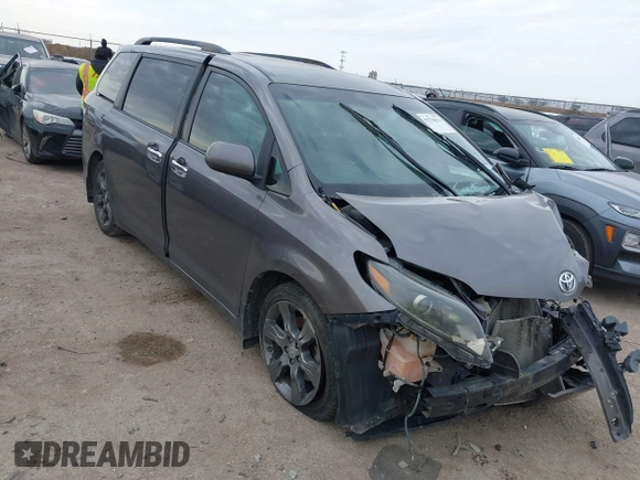 2015 Toyota Sienna SE with VIN 5TDXK3DC8FS652966, listed as a IAAI auction lot 41576611 with 108,858 mi miles and . Bid and sale history available at DreamBid. Image 1.