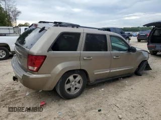 2006 Jeep Grand Cherokee Limited with VIN 1J4HS58N66C211974, listed as a Copart auction lot 60281945 with 220,229 mi miles and Salvage title. Bid and sale history available at DreamBid. Image 3.