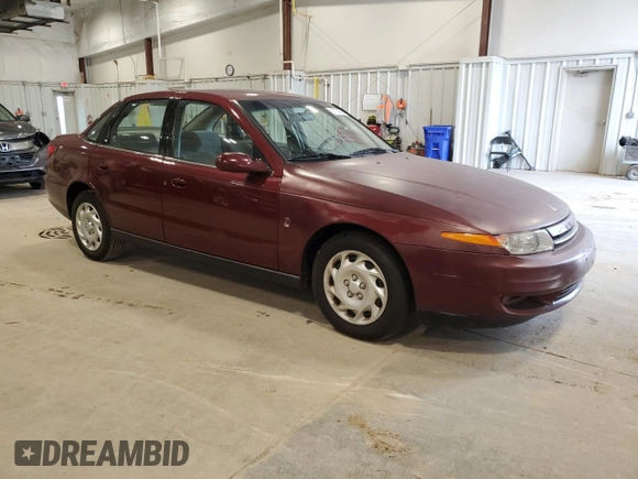2001 Saturn LS z VIN 1G8JU52F51Y549021, wystawiony jako Copart lot #81109084 z przebiegiem 14 974 mil mil oraz Tytuł czysty. Historia ofert i sprzedaży dostępna na DreamBid. Obrazek 4.