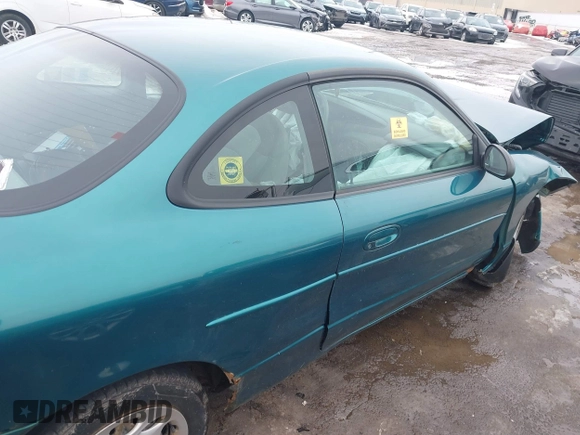 1998 Ford Escort z VIN 3FALP1137WR145199, wystawiony jako IAAI lot #41677279 z przebiegiem 92 232 mil mil oraz . Historia ofert i sprzedaży dostępna na DreamBid. Obrazek 8.