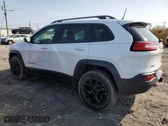 2015 Jeep Cherokee Trailhawk z VIN 1C4PJMBS6FW558653, wystawiony jako Copart lot #51066195 z przebiegiem 32 905 mil mil oraz Szkoda całkowita • Salvage title. Historia ofert i sprzedaży dostępna na DreamBid. Obrazek 2.