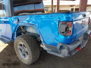 2021 Jeep Gladiator Rubicon with VIN 1C6JJTBGXML516164, listed as a IAAI auction lot 41837544 with 48,197 mi miles. Bid and sale history available at carsss.com. Image 6.