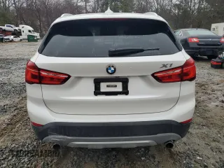 2017 BMW X1 xDrive28i with VIN WBXHT3C38H5F70088, listed as a Copart auction lot 50447715 with 119,649 mi miles and Clean Title. Bid and sale history available at carsss.com. Image 6.