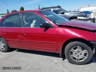2002 Honda Civic LX with VIN 2HGES16512H580836, listed as a IAAI auction lot 41831420 with 164,043 mi miles. Bid and sale history available at carsss.com. Image 13.