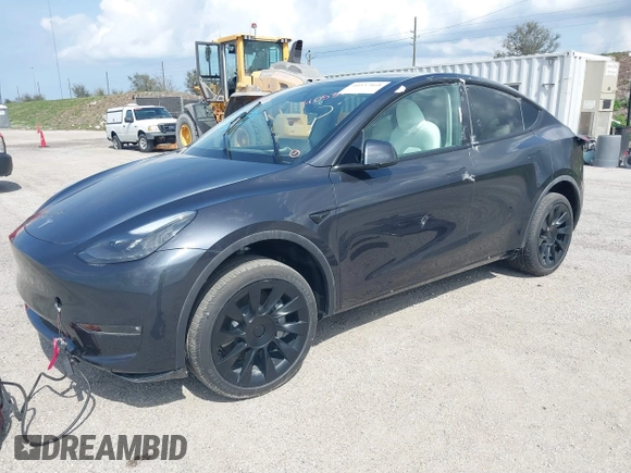 2024 Tesla Model Y Long Range z VIN 7SAYGAEE5RF074699, wystawiony jako IAAI lot #40537868 z przebiegiem Nie podano mil oraz . Historia ofert i sprzedaży dostępna na DreamBid. Obrazek 2.