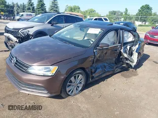 2015 Volkswagen Jetta Sport z VIN 3VWD17AJ5FM411217, wystawiony jako IAAI lot #42563776 z przebiegiem 84 520 mil mil oraz . Historia ofert i sprzedaży dostępna na DreamBid. Obrazek 17.