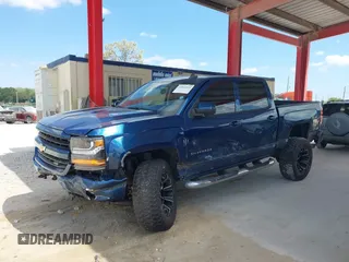 2018 Chevrolet Silverado 1500 LT with VIN 3GCUKREC0JG366590, listed as a IAAI auction lot 42045634 with 92,989 mi miles. Bid and sale history available at carsss.com. Image 6.