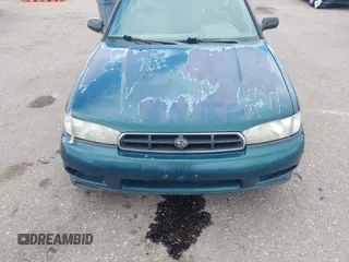 1999 Subaru Legacy L z VIN 4S3BK4355X6305664, wystawiony jako IAAI lot #42077758 z przebiegiem 70 585 mil mil oraz . Historia ofert i sprzedaży dostępna na DreamBid. Obrazek 6.