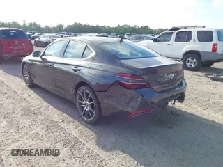 2023 Genesis G70 2.0T with VIN KMTG34TA4PU126965, listed as a IAAI auction lot 41971103 with 27,304 mi miles. Bid and sale history available at carsss.com. Image 3.