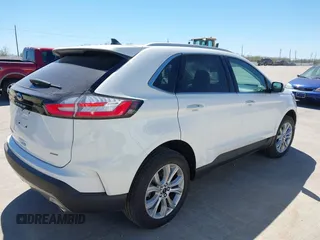 2024 Ford Edge Titanium z VIN 2FMPK4K98RBA75080, wystawiony jako IAAI lot #41843758 z przebiegiem 8687 mil mil oraz . Historia ofert i sprzedaży dostępna na DreamBid. Obrazek 4.
