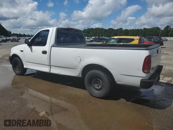 1997 Ford F-150 with VIN 1FTDF1721VND40734, listed as a Copart auction lot 62172315 with 158,102 mi miles and Salvage title. Bid and sale history available at DreamBid. Image 2.