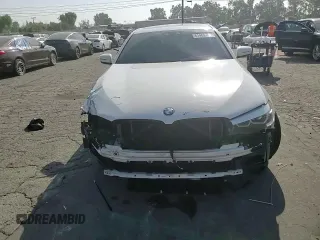 2020 BMW 5 Series 540i z VIN WBAJS1C01LCD37859, wystawiony jako Copart lot #61483155 z przebiegiem 49 087 mil mil oraz Szkoda całkowita • Salvage title. Historia ofert i sprzedaży dostępna na DreamBid. Obrazek 14.