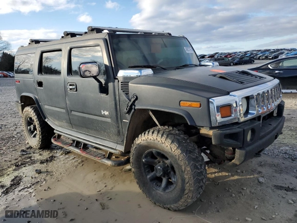 2003 Hummer H2 with VIN 5GRGN23U33H107610, listed as a Copart auction lot 48853765 with NaN miles and Salvage Title. Bid and sale history available at carsss.com. Image 4.