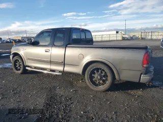 2003 Ford F-150 XL with VIN 1FTRX17L23NA98321, listed as a Copart auction lot 80576014 with 0 mi miles and Salvage Title. Bid and sale history available at carsss.com. Image 2.
