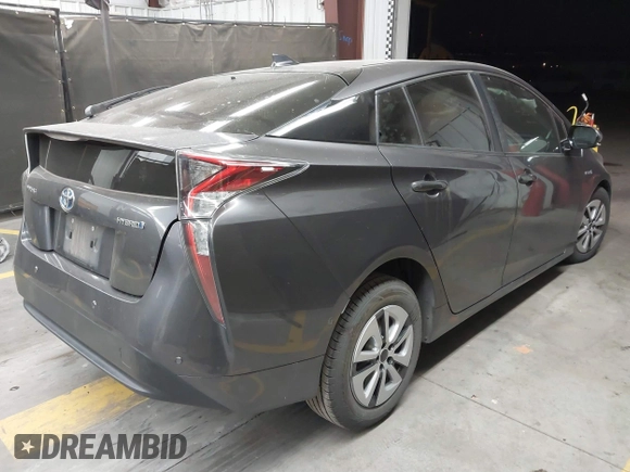 2018 Toyota Prius Two with VIN JTDKARFU6J3553871, listed as a IAAI auction lot 41577636 with 118,715 mi miles. Bid and sale history available at carsss.com. Image 4.