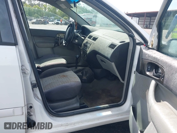 2007 Ford Focus S with VIN 1FAHP34N97W205190, listed as a IAAI auction lot 42489527 with 257,586 mi miles and . Bid and sale history available at DreamBid. Image 5.