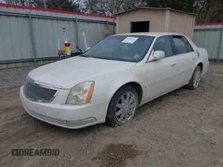2008 Cadillac DTS w/1SD with VIN 1G6KD57Y28U200858, listed as a IAAI auction lot 41330235 with 103,446 mi miles. Bid and sale history available at carsss.com. Image 2.