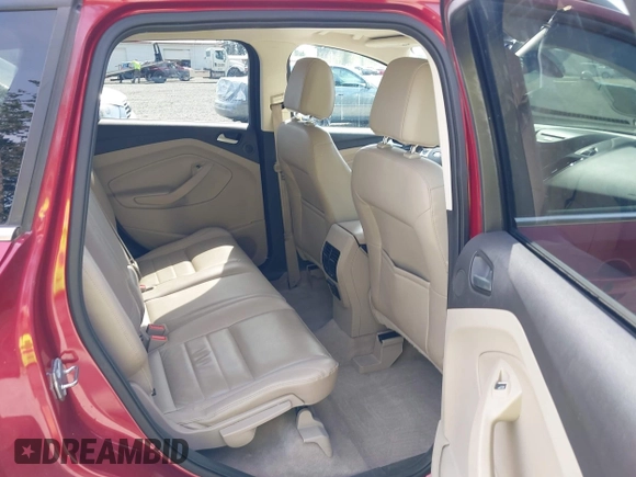 2015 Ford Escape Titanium with VIN 1FMCU9J93FUB28037, listed as a IAAI auction lot 42432345 with 133,242 mi miles and . Bid and sale history available at DreamBid. Image 8.