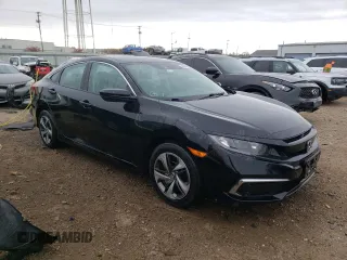 2019 Honda Civic LX with VIN 19XFC2F6XKE004169, listed as a Copart auction lot 83847414 with 65,517 mi miles and Salvage Title. Bid and sale history available at DreamBid. Image 4.