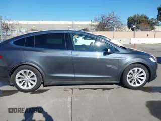 2016 Tesla Model X 70D with VIN 5YJXCBE24GF019450, listed as a IAAI auction lot 41517321 with 96,831 mi miles. Bid and sale history available at carsss.com. Image 13.