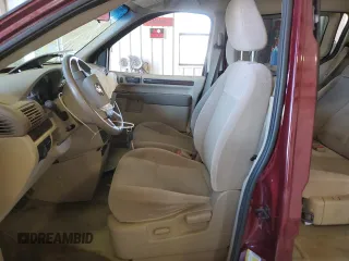2007 Ford Freestar SEL z VIN 2FMZA52257BA12486, wystawiony jako Copart lot #47176444 z przebiegiem 51 632 mil mil oraz Czysty tytuł • Clean title. Historia ofert i sprzedaży dostępna na DreamBid. Obrazek 7.