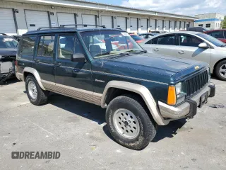 1993 Jeep Cherokee Country with VIN 1J4FJ78S4PL517648, listed as a Copart auction lot 72383564 with 127,156 mi miles and Salvage Title. Bid and sale history available at carsss.com. Image 4.