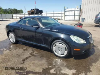 2003 Lexus SC 430 with VIN JTHFN48Y730047333, listed as a Copart auction lot 52112085 with 106,750 mi miles and Salvage title. Bid and sale history available at DreamBid. Image 4.