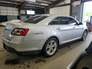 2014 Ford Taurus SEL z VIN 1FAHP2E86EG128370, wystawiony jako Copart lot #58216645 z przebiegiem 95 488 mil mil oraz Tytuł czysty. Historia ofert i sprzedaży dostępna na DreamBid. Obrazek 3.