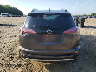 2018 Toyota RAV4 SE with VIN JTMNFREV6JJ157671, listed as a Copart auction lot 55476875 with 93,749 mi miles and Salvage title. Bid and sale history available at DreamBid. Image 6.