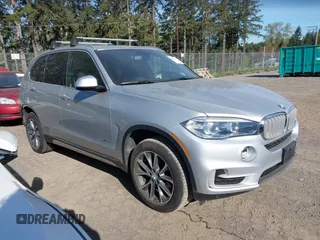 2018 BMW X5 xDrive35i with VIN 5UXKR0C52JL073889, listed as a IAAI auction lot 42035042 with 36,564 mi miles. Bid and sale history available at carsss.com. Image 1.