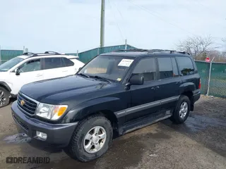 1998 Toyota Land Cruiser with VIN JT3HT05J2W0017214, listed as a IAAI auction lot 41716028 with 214,047 mi miles. Bid and sale history available at carsss.com. Image 18.