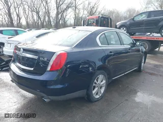 2009 Lincoln MKS with VIN 1LNHM93R39G619004, listed as a IAAI auction lot 41834480 with 184,817 mi miles. Bid and sale history available at carsss.com. Image 4.
